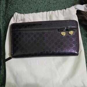 Gucci Embossed Patent Zip-Around Wallet in Plum